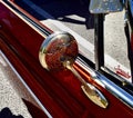 Of silver engraved back end of a Classic 1966 Orange Sparkled Chevy IMPALA Car