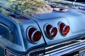 Rear red headlights of 1965 Chevy Impala Convertible at a car show in CA 2021 Royalty Free Stock Photo