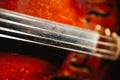 Fretboard with string of old shabby cello Royalty Free Stock Photo