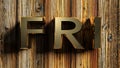 FRI brass write on raw wood - 3D rendering Royalty Free Stock Photo