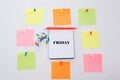 Friday, Concept write on Office table, notepad and colorful pencil. View from above with copy space Royalty Free Stock Photo