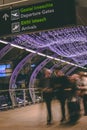 Friday, December 22nd, 2017, Dublin Ireland - blurred people moving inside of Terminal 2 of Dublin Airport