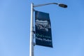 Friday Harbor, WA USA - circa November 2021: Low angle view of an Autumn in Friday Harbor banner on a lamp post on a bright, sunny