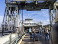 Friday Harbor, WA USA - circa November 2021: View of people lined up, waiting to board the Tillkum Washington State Ferry on a