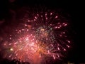 Friday Night Waikiki Fireworks with red color burst in the air