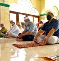 A friday prayer that apply social distancing and health protocol covid