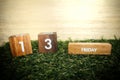 Friday 13th on wooden calendar. bad luck, Misfortune Day. Royalty Free Stock Photo
