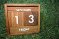 Friday 13th on wooden calendar. bad luck, Misfortune Day.