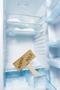 Fridge with frost and North Pole sign. Royalty Free Stock Photo