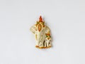 Fridge magnet souvenir in shape of two decorated white and golden elephants on white background Royalty Free Stock Photo