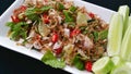 Frie fish spicy salad with herbs
