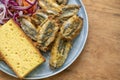 fried anchovy fish with corn bread Royalty Free Stock Photo