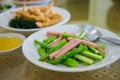 Fried asparagus with ham