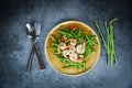 Fried asparagus shrimp prawns cooking food on wooden plate and herb spices fresh asparagus bunch on the table Royalty Free Stock Photo