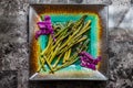 Fried asparagus on a turquoise plate. Royalty Free Stock Photo