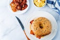 Fried bacon cheese egg salad  bagel Royalty Free Stock Photo