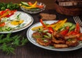 Fried meat with vegetables and eggs Royalty Free Stock Photo