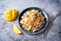 Fried bacon mango Red bell pepper rice in a plate Royalty Free Stock Photo