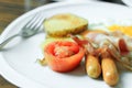 Fried bacon strips on white plate. Royalty Free Stock Photo