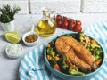 Fried baked fish steak salmon, trout with broccoli and carrots on a plate Royalty Free Stock Photo