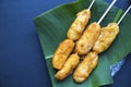 Fried banana cue on banana leaf plate. Sweet fruit cooked dessert.