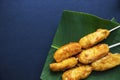 Fried banana cue on banana leaf plate. Fried fruit dessert. Royalty Free Stock Photo