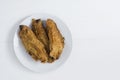 Fried bananas, banana fritters or pisang goreng on white background Royalty Free Stock Photo