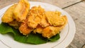 Fried bananas on a leaf on a plate for an afternoon snack