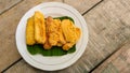 Fried bananas on a leaf on a plate for an afternoon snack