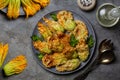 Fried in a batter Zucchini Flowers stuffed with ricotta cheese and parsley. Royalty Free Stock Photo