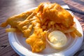 Fried battered fish with chips Royalty Free Stock Photo