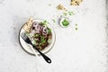 Fried beef minced bowl with basmati rice, purple onions, micro greens. Top View.