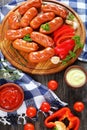 Fried beef sausages with fresh thyme Royalty Free Stock Photo