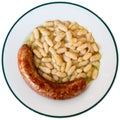 Fried botifarra sausage served with cooked white beans