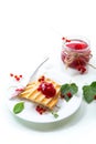 fried bread croutons for breakfast with redcurrant jam in a plate with berries Royalty Free Stock Photo