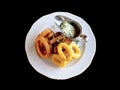 Fried bread with garlic, onion and squid rings Royalty Free Stock Photo