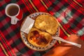 Fried bread slices with cheese and tea on table Royalty Free Stock Photo