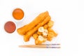 Fried bread stick or You Tiao served with Chinese tea.