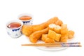 Fried bread stick or You Tiao served with Chinese tea.