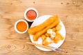 Fried bread stick or You Tiao served with Chinese tea.