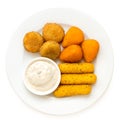 Fried breaded brie and camembert nuggets and mozzarella sticks on a white ceramic plate with white dip on white from above Royalty Free Stock Photo