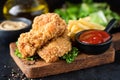 Fried Breaded Chicken Wings, French Fries And Ketchup Royalty Free Stock Photo