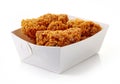 Fried breaded chicken wings in white cardboard box Royalty Free Stock Photo