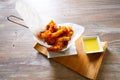 Fried breaded squid and curry sauce and lime Royalty Free Stock Photo