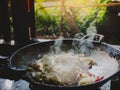 Fried cabbage in a pan. Fried food in nature. Cooking on an open fire Royalty Free Stock Photo