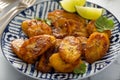 Fried caramelized plantains served with lime wedges Royalty Free Stock Photo