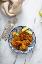 Fried caramelized plantains served with lime wedges Royalty Free Stock Photo