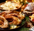 Fried carp fish slices on a ceramic plate, close up. Traditional christmas eve dish. Royalty Free Stock Photo