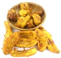 Fried Cempedak ( also known as Artocarpus integer ) in a basket and Fried Banana Fritters