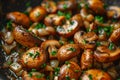 Fried champignons and king trumpet mushrooms with onions and parsley in pan